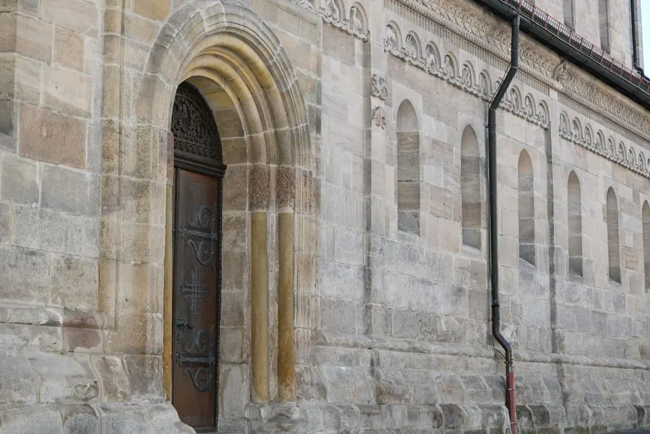 Explore the intricate design of a historic church doorway in Baden-Württemberg, Germany.